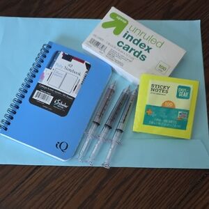 Blue Spiral Notebook with Office Supplies